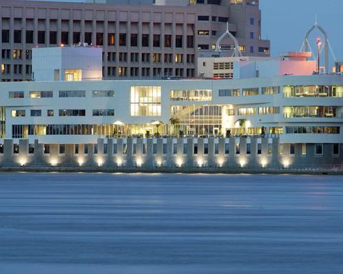 Exterior photo of Baptist Heart Hospital at night.